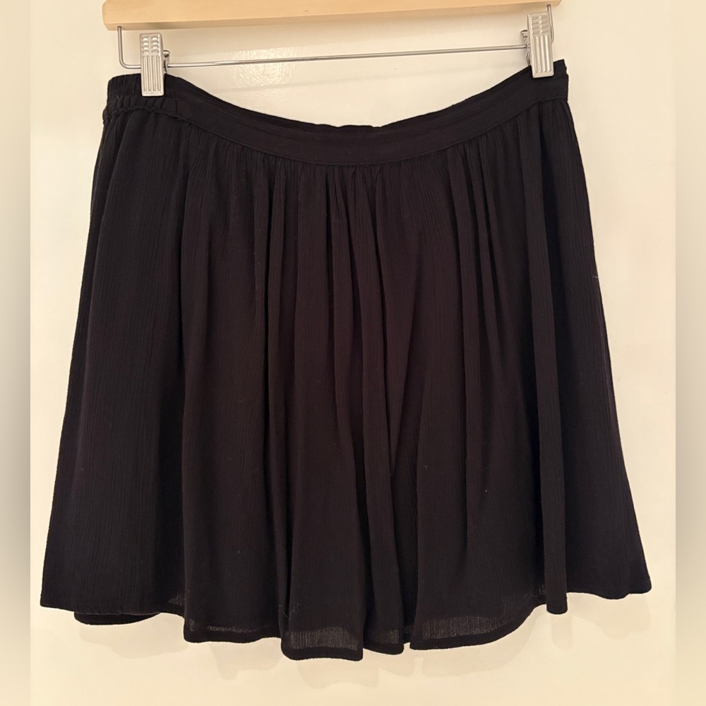 Crepe black mini skirt with lining